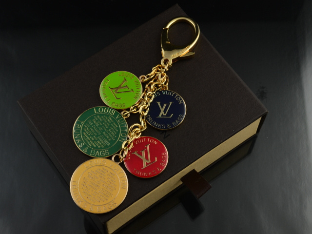 Louis Vuitton keychain fob round made from re-purposed LVMH hand